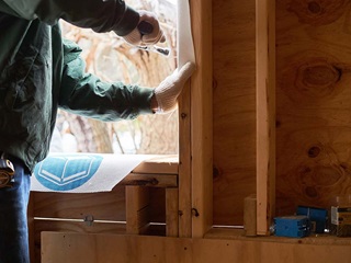 Contractor prepping for Marvin replacement window installation