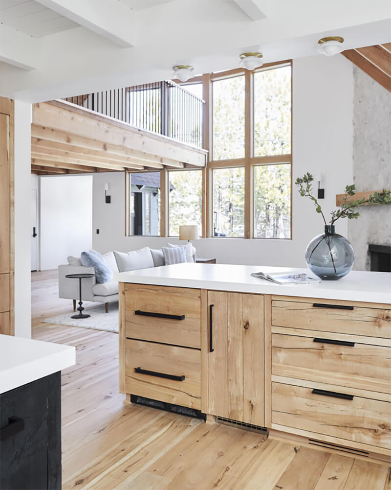 Large open concept kitchen looking into living room with multiple Marvin Windows