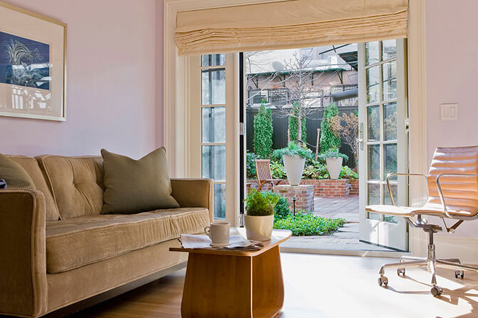 Traditional Brownstone Remodel with large Marvin Door