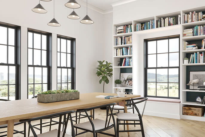 Sitting room with black windows and dark decorating accents