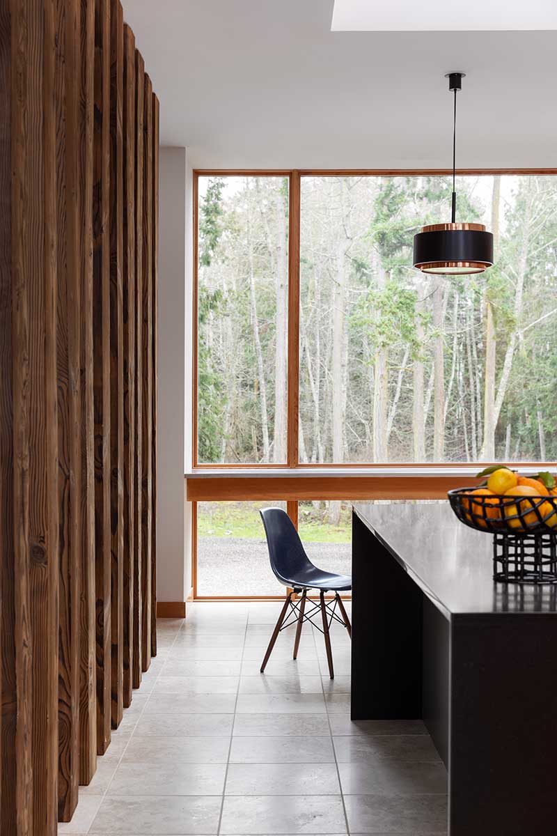 A modern kitchen featuring a large Marvin Ultimate Direct Glaze window.