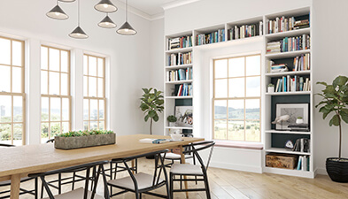 Living area with Marvin mixed frame and sash window with clear coat finish