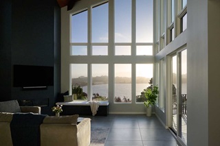 Interior living room with Marvin Signature Ultimate Awning, Direct Glaze windows, and Patio Doors