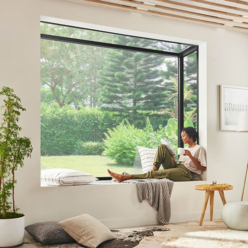 Interior of home with woman in Marvin Skycove window box