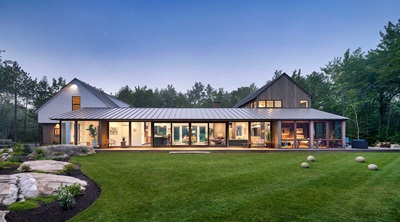 Exterior of home with Marvin Signature Ultimate Direct Glaze, Awning, and Casement windows